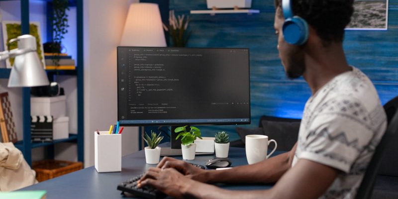 african-american-coder-employee-programming-business-code-1.jpg african-american-coder-employee-programming-business-code-1.jpg